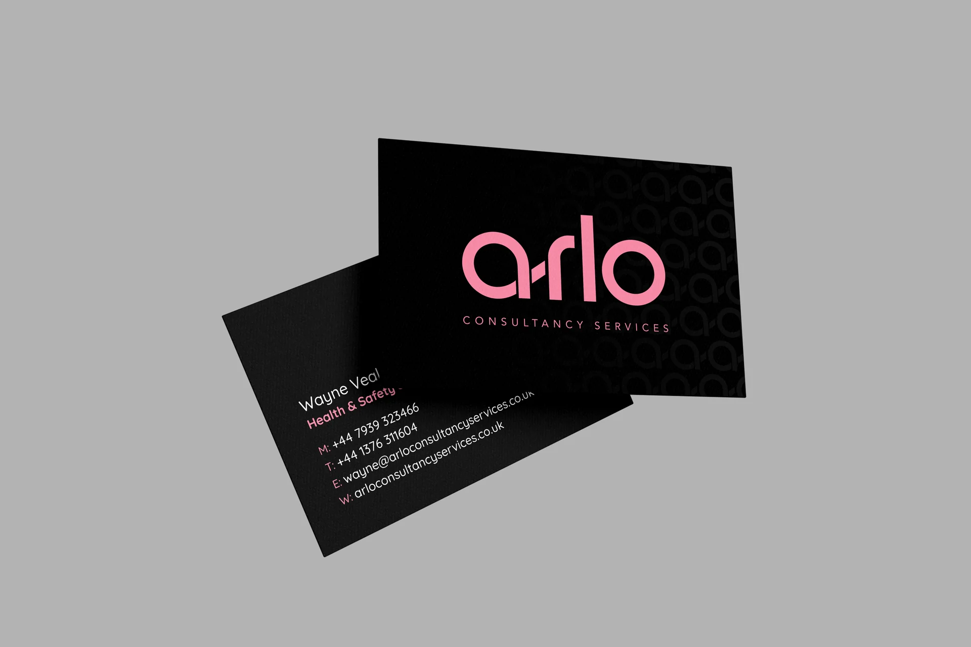 arlo consultancy services business cards: the pink logo on the front, contact details on the back, on rich black card